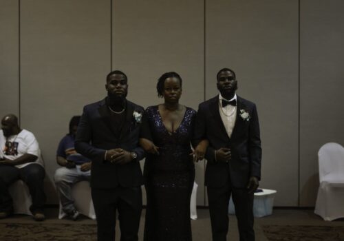 Grooms-mother-escorted-in